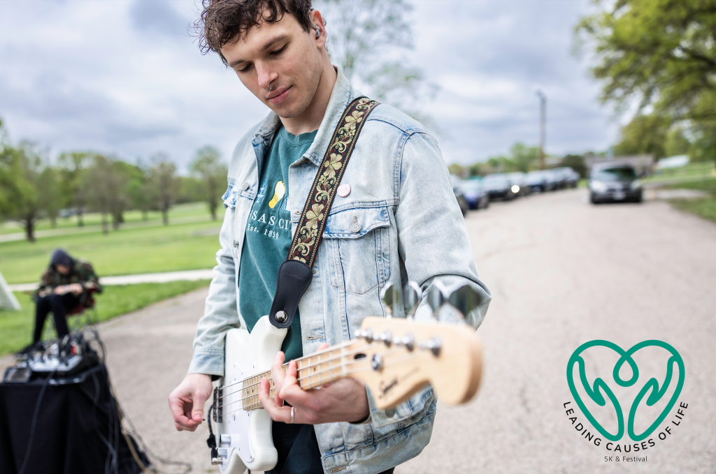 bass player at outdoor event